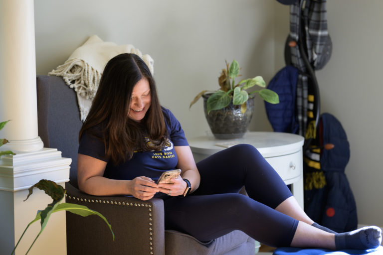 Stacy on Phone in Chair