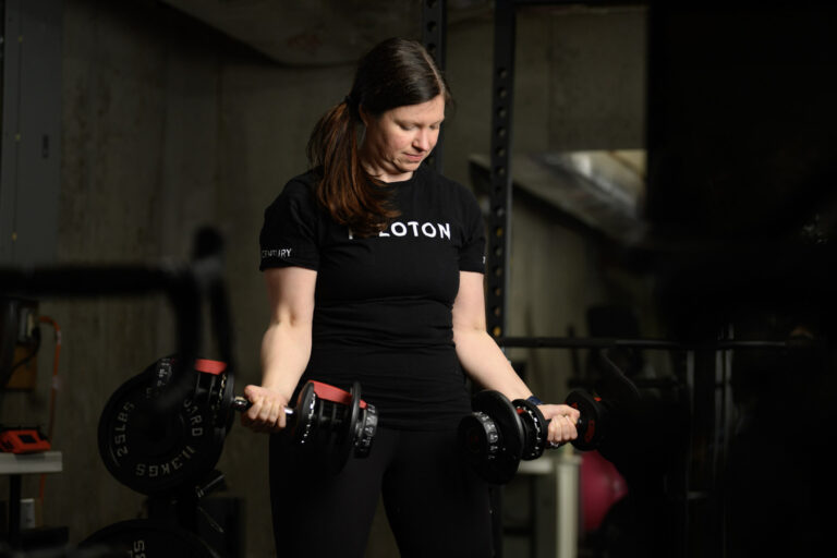 Stacy With Weights and Peloton Shirt